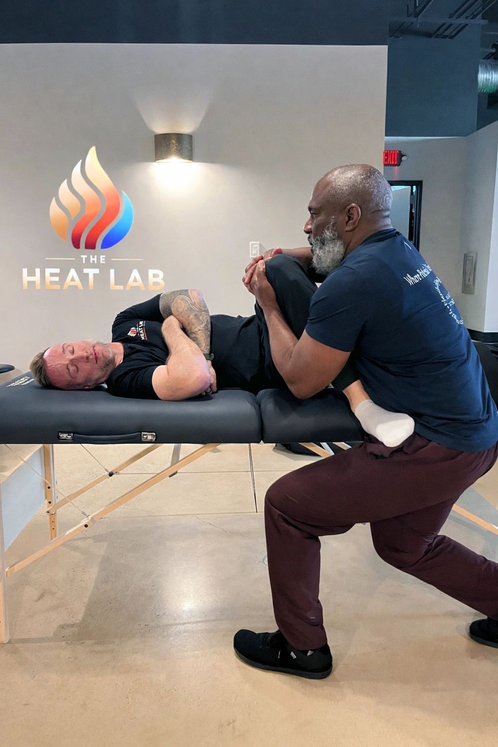 Allen Brown stretching a client